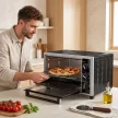 46 literes mini sütő forgónyárssal, légkeveréses sütővel, hőmérséklet-szabályozással és időzítővel, 1800 W, fekete