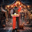 Animált halloweeni pattogatott kukoricás bohóc ugráló fejjel, hátborzongató hangeffektusokkal, vidámparki zenével és ragyogó szemekkel