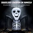 Felfújható Halloween csontváz, kikúszik a földből, LED fényekkel, ijesztő dekoráció beltéri és kültéri használatra.